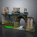 Ancient Stone Arched Entrance Gate of Castle Ruins with Green Grass