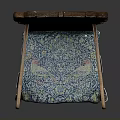 Vintage Wooden Chair With Ornate Carvings And Blue Fabric Cushioned Seat