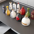 Colorful Wine Bottles And Glasses Displayed On Modern Gray Table With Diverse Designs