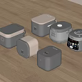 Modern Kitchen Appliances In Various Styles And Colors On Wooden Countertop
