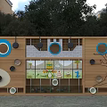 Kindergarten Exterior Wall With Colorful Circular Decorations Wooden Panels And Stone Textures