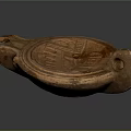 Ancient Ceramic Artifact With Carved Patterns Two Holes And Traditional Design