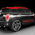 Black Mini SUV Featuring Red Accents Orange Stripes and Sporty Design with Glossy Alloy Wheels