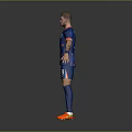 Man In Blue Soccer Jersey Number 9 Standing With Arms Outstretched On Gray Background