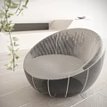 Modern Rounded Single Sofa with Striped Upholstery like Potted Plant and Light Wooden Floor