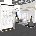 Modern Open Bridal Shop With White Wedding Dresses On Hangers And Display Area