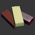 White Block Cheese Displayed On Red Shiny Wrappers Against Dark Background