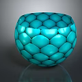 Turquoise Glossy Bowl With Hexagonal Scaled Pattern On Dark Background