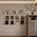 Modern Shoe Cabinet with Wooden Body and Woven Doors Near Decorative Bookshelf and Wall Art