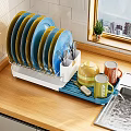Colorful Tableware Set With Plates Utensils Mugs Teapot On Dish Rack Wooden Countertop