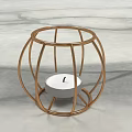 Modern Round Metal Frame Candle Lamp With White Candle On Marble Surface