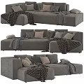 Modern Gray Sofa with Pillows and Striped Blankets in Cozy Interior 3d model