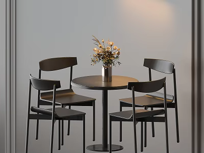 Round Black Dining Table With Four Black Chairs And Vase With Flowers In Interior 3d model
