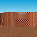 Circular Red Brick Latticed Structure With Central Opening Against Blue Sky On Brown Ground 3d model