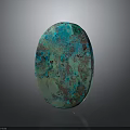 Polished Oval Turquoise Stone with Speckled Green and Brown Patterns on Dark Background