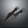 Two Black And Silver Textured Daggers With Sharp Blades And Blue Red Accent Handles