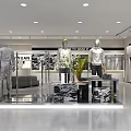 Bright Modern Clothing Store Featuring Window Mannequins And Well Arranged Interior Clothing Displays