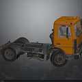 Orange Truck Chassis With Cab And Large Wheels On Dark Background