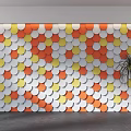 Background Wall with Orange Yellow White Circular Scaly Wavy Patterns and Green Plant