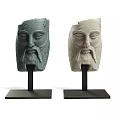 Ancient Carved Stone Head Sculptures Featuring Bearded Faces in Green and Light on Black Stands