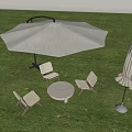 Outdoor Table and Chairs Set on Green Grass with Beige Umbrella and Folded Parasol
