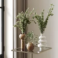 Brown Cylindrical Spherical And White Stacked Vases With Green Foliage On Glass Table