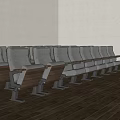 Public Chairs With Gray Seats And Metal Frames In Indoor Wooden Floor Space