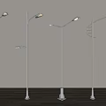 White Outdoor Lights with Five Different Designs Standing on Wooden Floor and Light Colored Background