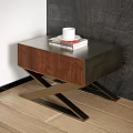 Modern Bedside Table With Wood Top Metal Cross Legs And White Mug Stack Of Books