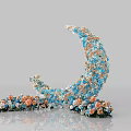 Beautiful Crescent Moon Decorative Arrangement With Blue Orange Flowers Crystal Accents And Scattered Blooms