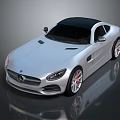 Silver Mercedes Two Door Sports Car With Black Roof And Red Brake Calipers