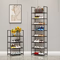 Black Multi tiered Shoe Rack with Brown Bag Vase Sunflowers and Various Shoes