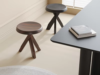 Modern Wooden And Dark Stools With Tripod Legs Near Black Table And Books 3d model