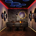 Modern Bar Interior Design With Blue Circular Ceiling Lights Wine Racks And Cozy Seating