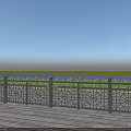 Metal Decorative Fence with Intricate Patterns on Wooden Deck with Green Grass and Blue Sky