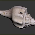 Pinkish Speckled Stone Conch Shell Sculpture With Textured Surface Carved Details And Central Hole
