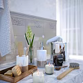Bathroom Accessories with Towel Candle Lily Vase Soap Dispenser and Marble Countertop