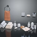 Bathroom Daily Essentials With Towels Soap Dispensers Lotion Bottles And Toothbrushes
