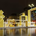 Hainan Famous Snacks Square Stall with Yellow Structure and Night Decor