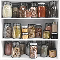 Various Grains Nuts and Spices in Glass Jars Neatly Arranged on White Kitchen Shelves