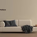 Poliform Beige Chaise Lounge With Grey Cushions Throw Blanket And Side Table