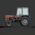 Old Orange Green Tractor Model With Large Tires On Green Circular Base