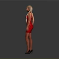 A woman in red shiny dress with long braided hair standing against grey background