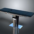Modern Medical Surgical Table With Blue Padded Top And Stainless Steel Frame