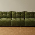 Green Three Seater Sofa With Modern Design And Plush Velvet Upholstery