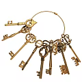 Vintage Golden Skeleton Keys Hanging On Decorative Ring With Ornate Patterns
