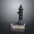 Black Fire Hydrant With Hexagonal Concrete Base Pointed Top Orange Outlet And Round Cover