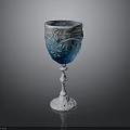 Elegant Blue Glass Goblet With Silver Floral Patterns And White Base