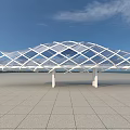 Modern Glass Bridge With White Frame Structure Near Coastal Walkway Area