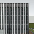Modern Office Building With Glass Curtain Wall Surrounded By Lawn And People Walking